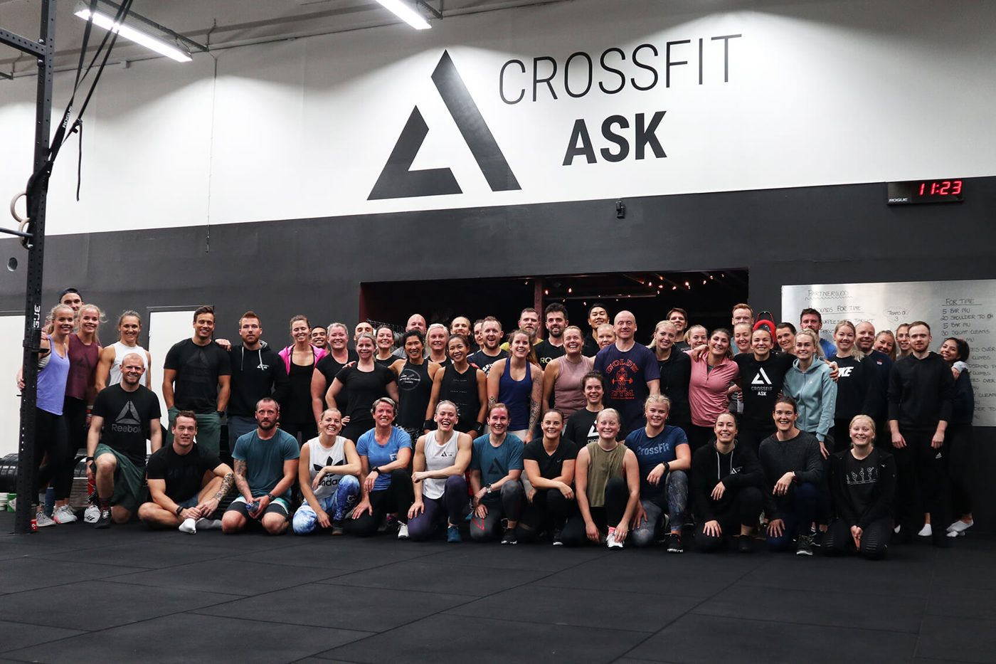 The whole Ask family gathered under the CrossFit Ask logo